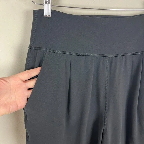 Athleta Elation Pants Women Medium Black Tapered Pleated Stretch Knit Athleisure - Picture 6 of 14